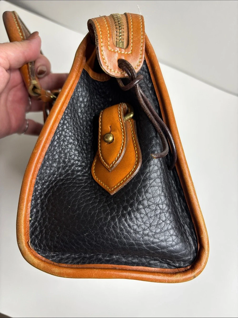 Dooney & Bourke Black Pebbled Leather Satchel with Tan Trim